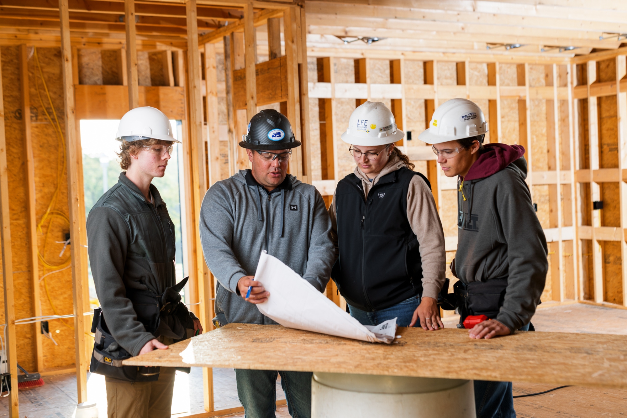SCC Construction program instructor and students