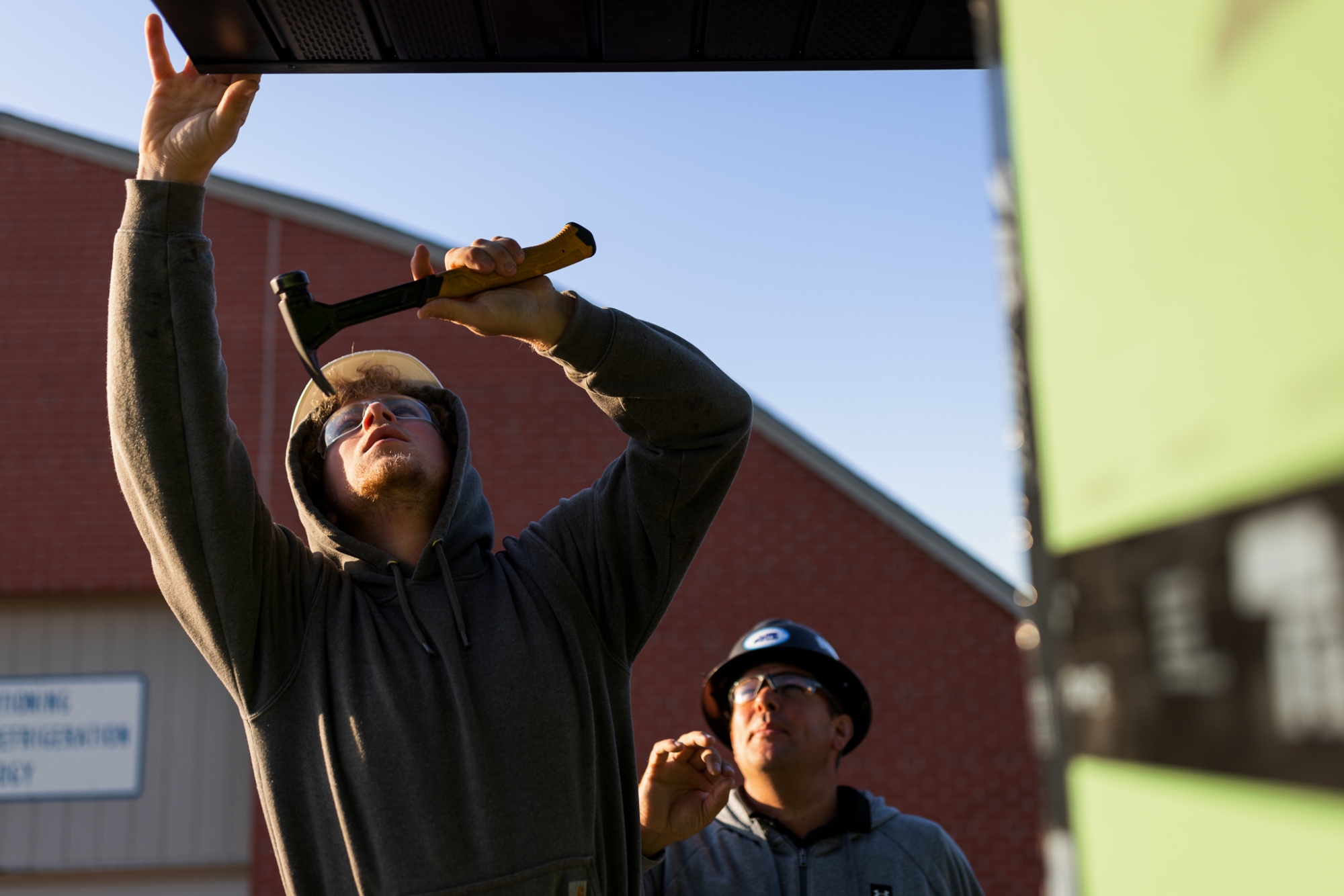 SCC Construction program instructor and students