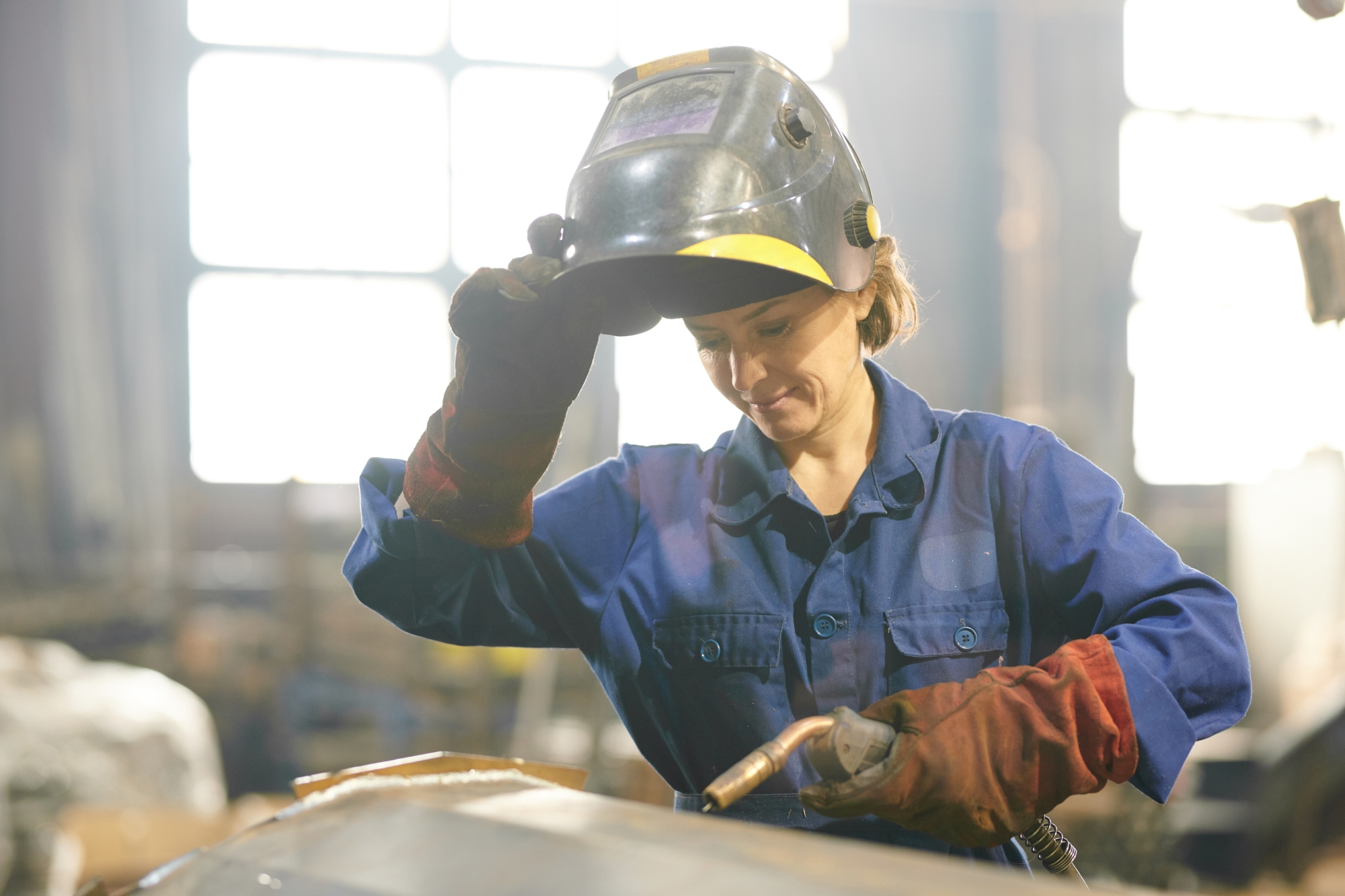 female welding