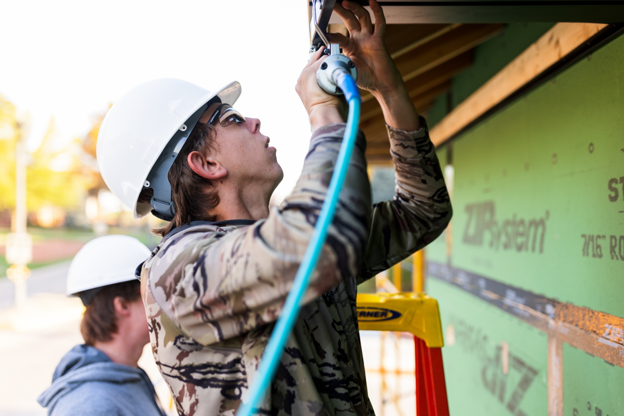SCC Construction program instructor and students